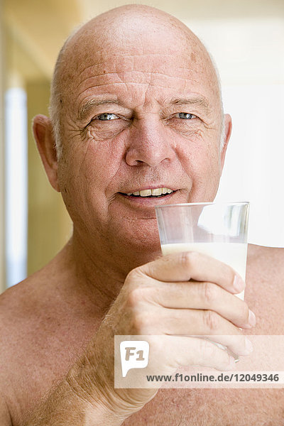 Portrait of Man Drinking Glass of Milk