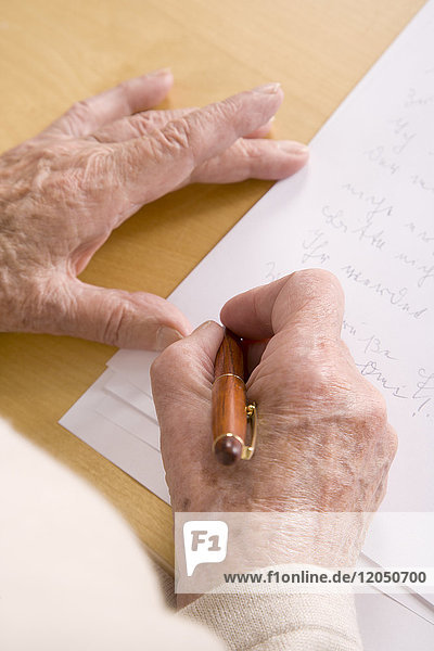 Woman's Hands Writing Letter