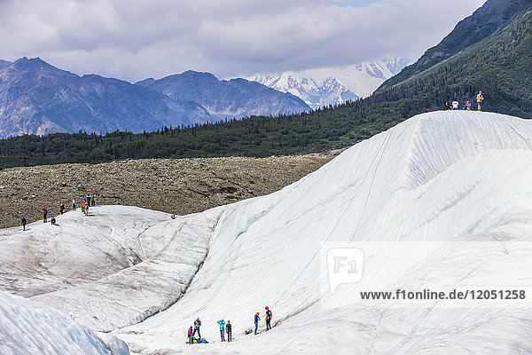 Guided groups recreate on Root Glacier in Wrangell-St. Elias National Park; Alaska  United States of America