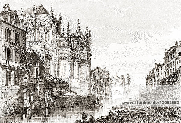 The Church of Saint-Pierre  Caen  France in the 19th century. Until around the mid 19th century  the eastern end of the church faced onto a canal that was then covered and replaced by a road. From Album-Evenement  Prime du Journal L'Evenement  published 1865.