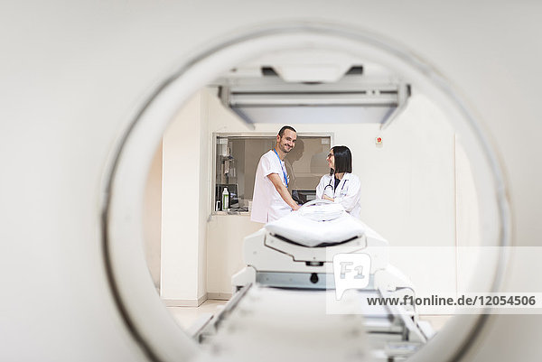 Two doctors at MRI scanner