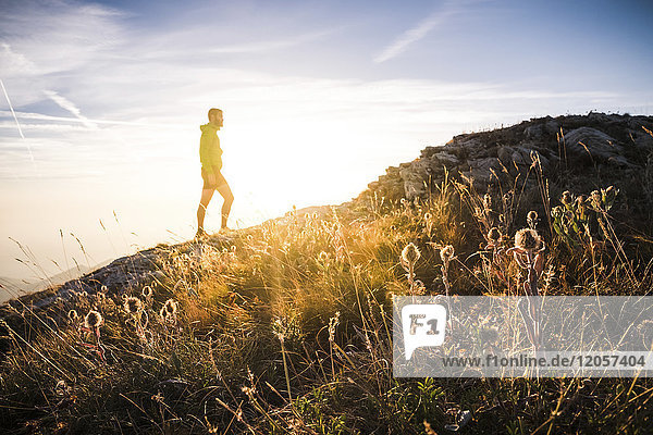Italy  mountain running man standing on trail