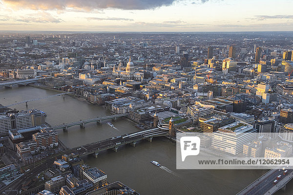 Aerial view of London with bridges crossing river Thames.