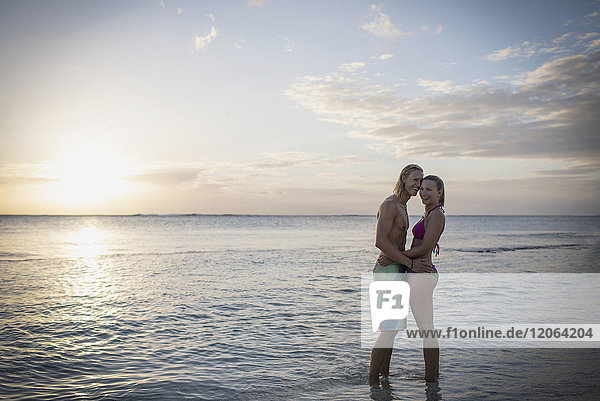 Portrait of young couple at beach