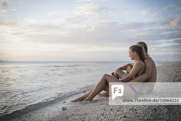 Young couple relaxing at beach
