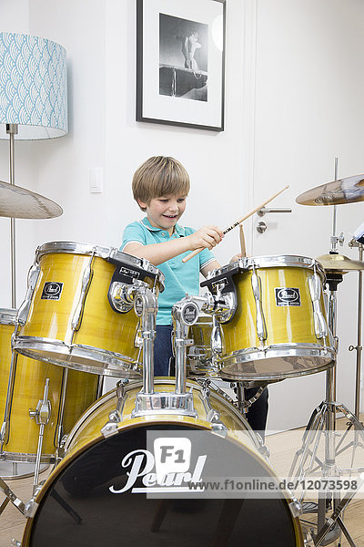 A child playing the drums.