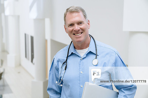 Portrait of smiling Caucasian doctor
