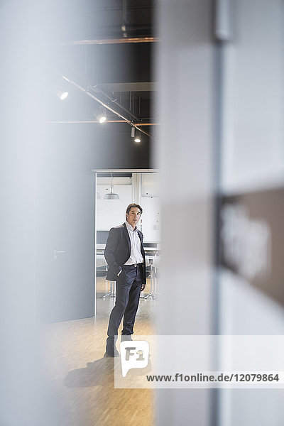 Businessman standing on office floor