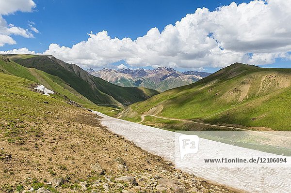 Snowfield along the road to Song Kol Lake  Naryn province  Kyrgyzstan  Central Asia.
