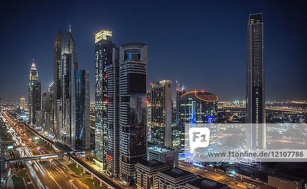 Cityscape and skyscraper skyline at night  Dubai  United Arab Emirates