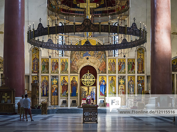 Ornate interior and tourists inside St. Mark's Church  a Serbian Orthodox Church in Tasmajdan Park; Belgrade  Vojvodina  Serbia