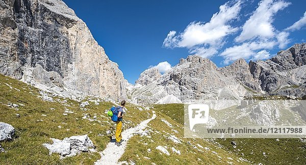 Hiker at the Rosengarten-Group Conversion  Dolomites  South Tyrol  Trentino-Alto Adige  Italy  Europe