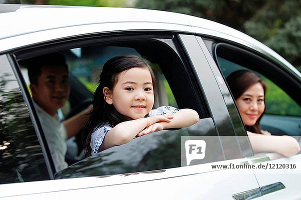 Happy families travel by car