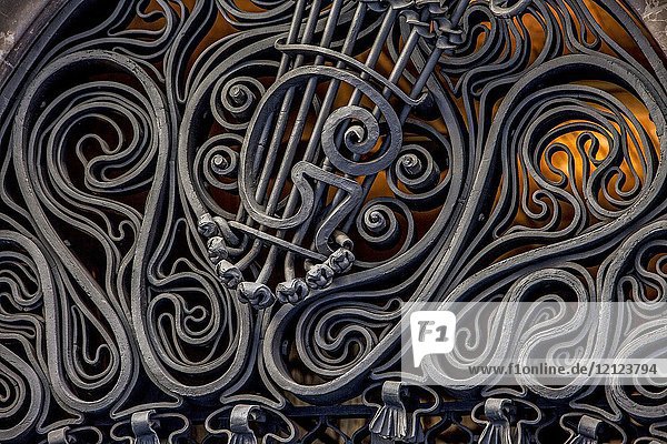 Detail above the Main Door of Palau Guell designed by Gaudi in Barcelona  Catalonia  Spain.