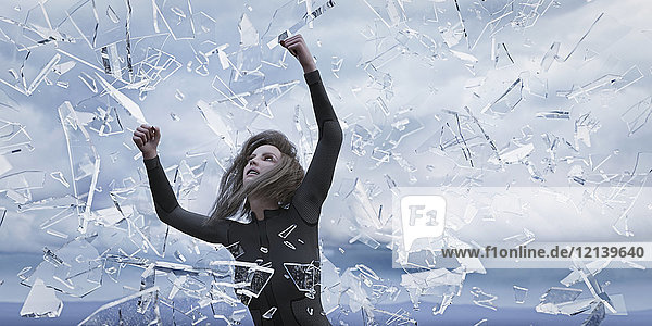 Shards of glass falling on woman