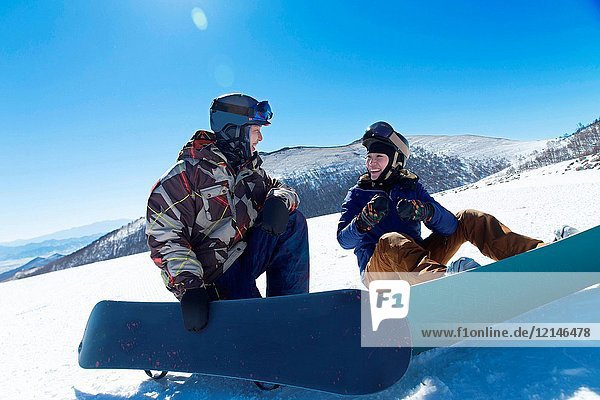 Young men and women outdoor skiing