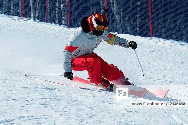 Young woman outdoor skiing