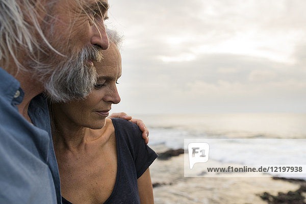 Portrait of a handsome senior couple at the sea
