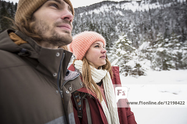 Couple on a trip in winter looking around