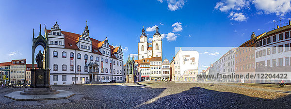 Germany  Lutherstadt Wittenberg  view to town hall  row of houses and St Mary's Church