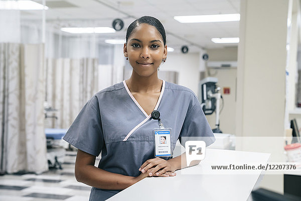 Portrait of smiling African American nurse in hospital
