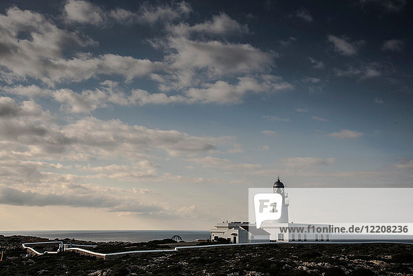 Whitewashed lighthouse on coast  Fornells  Menorca  Spain