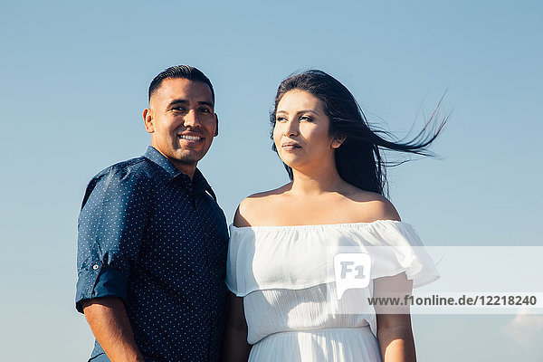 Portrait of hispanic couple outdoors