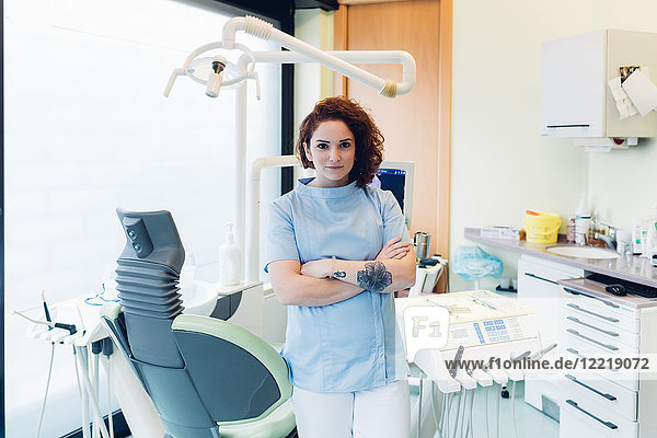 Portrait of female dentist in dentist office