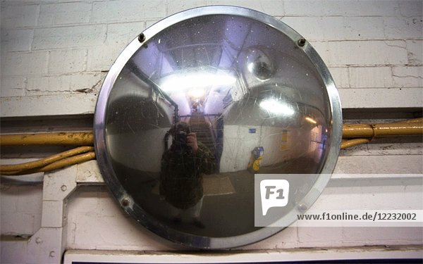 3D Stereo Effect of Photographer's Reflection in Round Metal Security Mirror