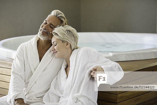 Couple in bathrobes relaxing at spa