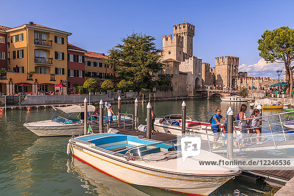 View of Scaliger Castle and boats in harbour  Sirmione  Lake Garda  Lombardy  Italian Lakes  Italy  Europe