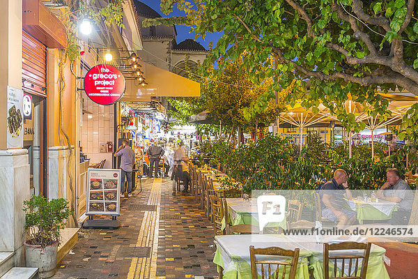 View of Greek restaurants in Monastiraki Square at dusk  Monastiraki District  Athens  Greece  Europe