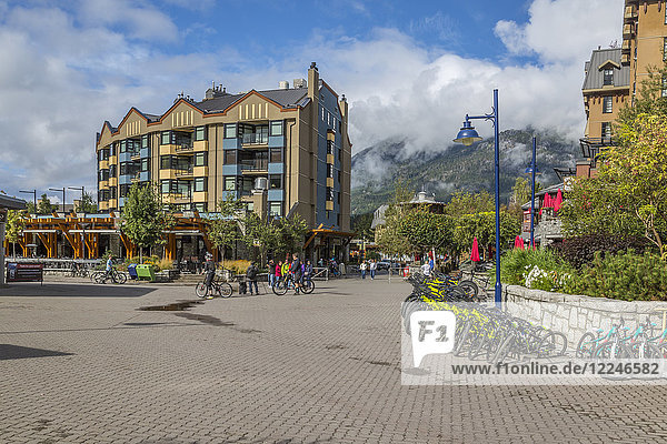 Cycles and shops aligning Skiers Plaza  Whistler Village  British Columbia  Canada  North America