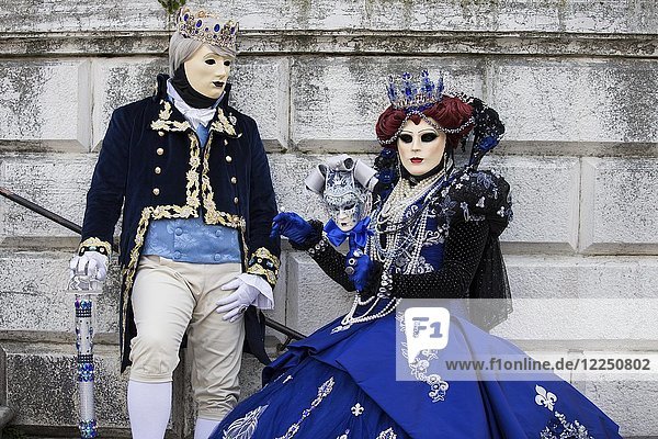 Pair in historical robes on stairs  carnival costume  Carnival in Venice  Italy  Europe