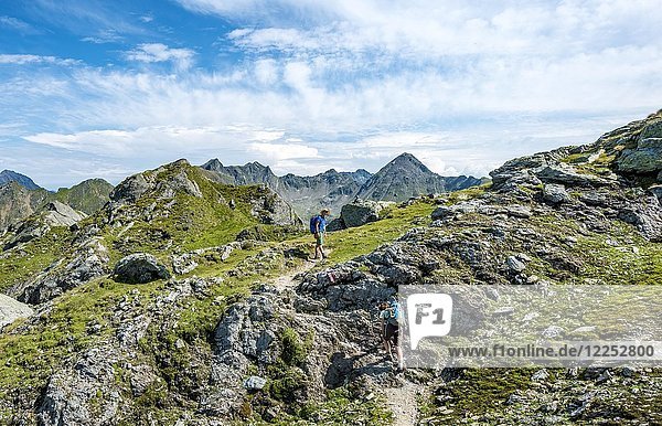 Two hikers on Schladminger Höhenweg  Schladminger Tauern  Schladming  Styria  Austria  Europe