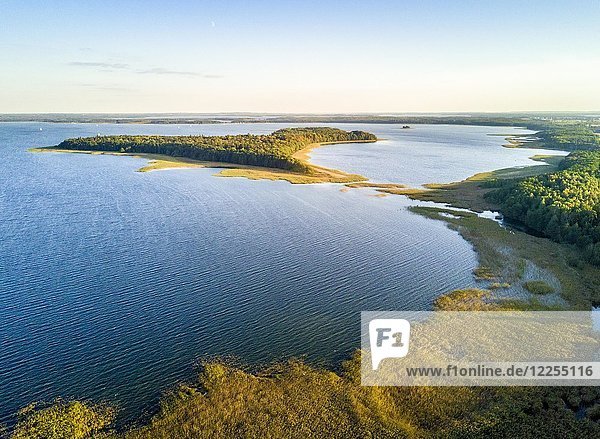 Aerial view of Upalty island by the sunset in Mamerki  Mazury district lake  Poland  Europe
