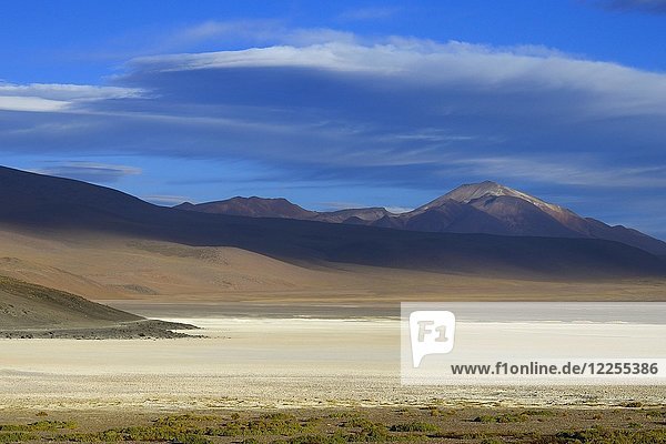 Clouds over the mountains near Laguna Ramaditas  lagoon route  Nor Lípez province  Potosi department  Bolivia  South America