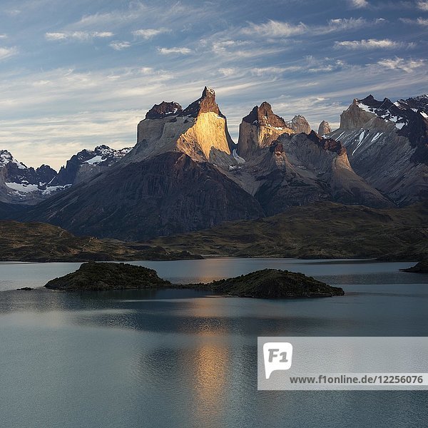 Mountain massif Cuernos del Paine at sunrise  glacial lake Lago Pehoe  National Park Torres del Paine  Chile  South America