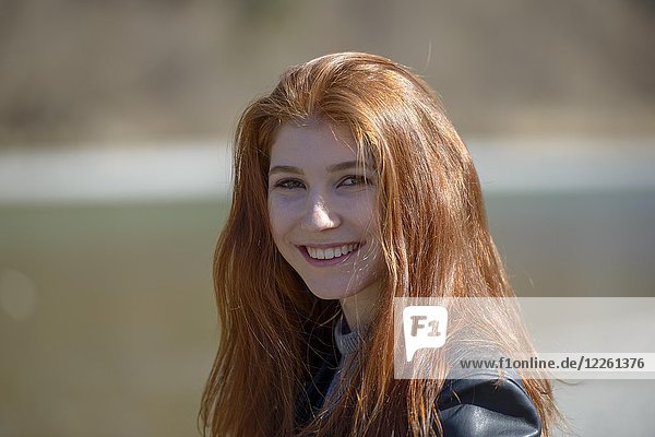 Portrait  young woman  girl  teenager with long red hair  Bavaria  Germany  Europe