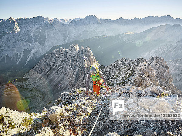 Austria  Tyrol  Innsbruck  mountaineer at Nordkette via ferrata