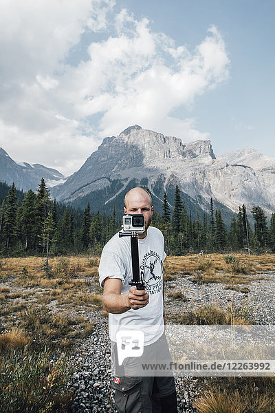 Canada  British Columbia  Yoho National Park  man holding selfie stick