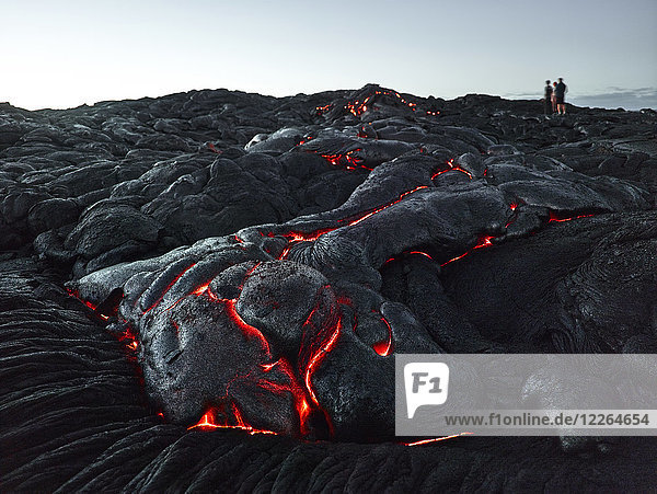 Hawaii  Big Island  Hawai'i Volcanoes National Park  tourists standing on lava field