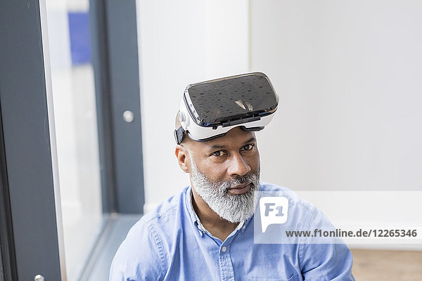 Portrait of businessman with Virtual Reality Glasses