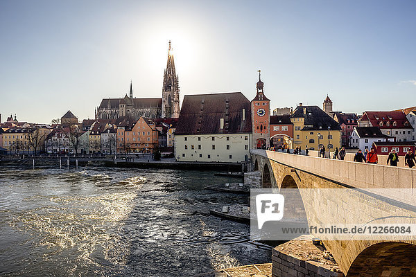 Germany  Regensburg  view to cathedral at the old town with Steinerne Bruecke over Danube river