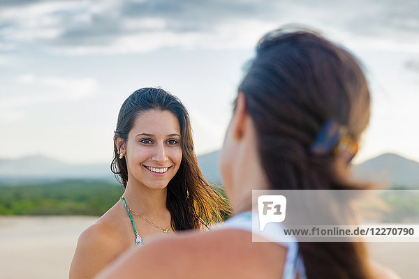 Portrait of woman looking at mother smiling  Caucaia  Ceara  Brazil
