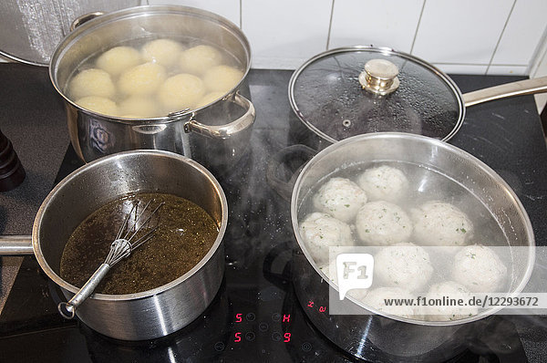 Cooking pots with bread dumplings  potato dumpling and sauce