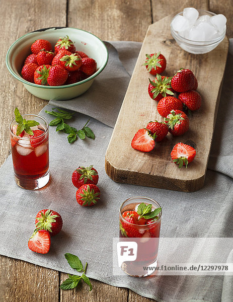 Strawberry drinks and fresh strawberries