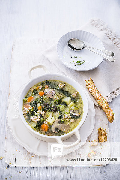 Vegetable salsiccia soup with mushrooms