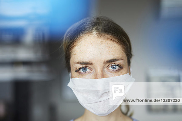 Portrait of woman wearing surgical mask