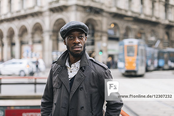 Portrait of stylish man in the city